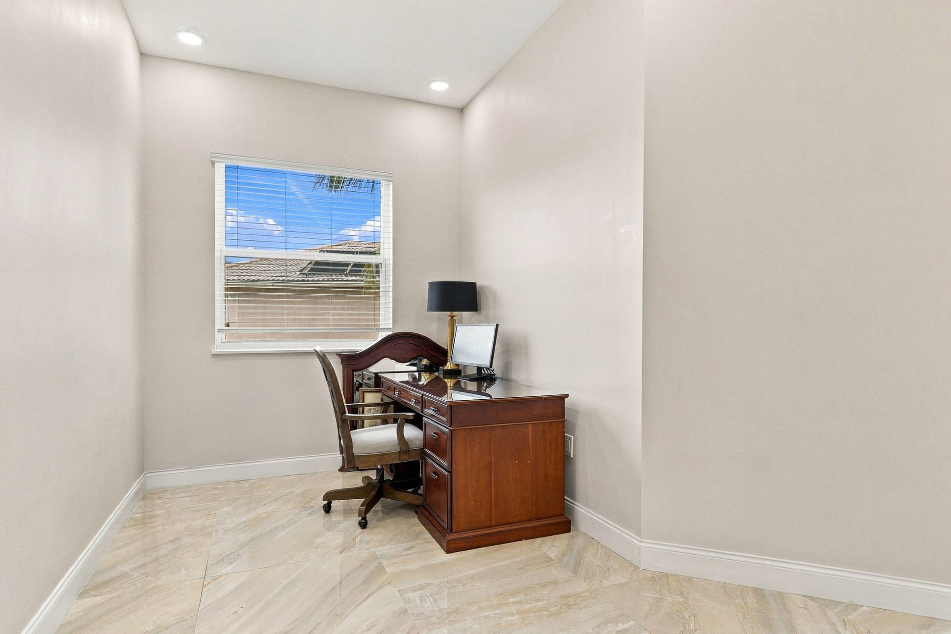 Upstairs Primary Bedroom has room for an office or a small reading and relaxation area.