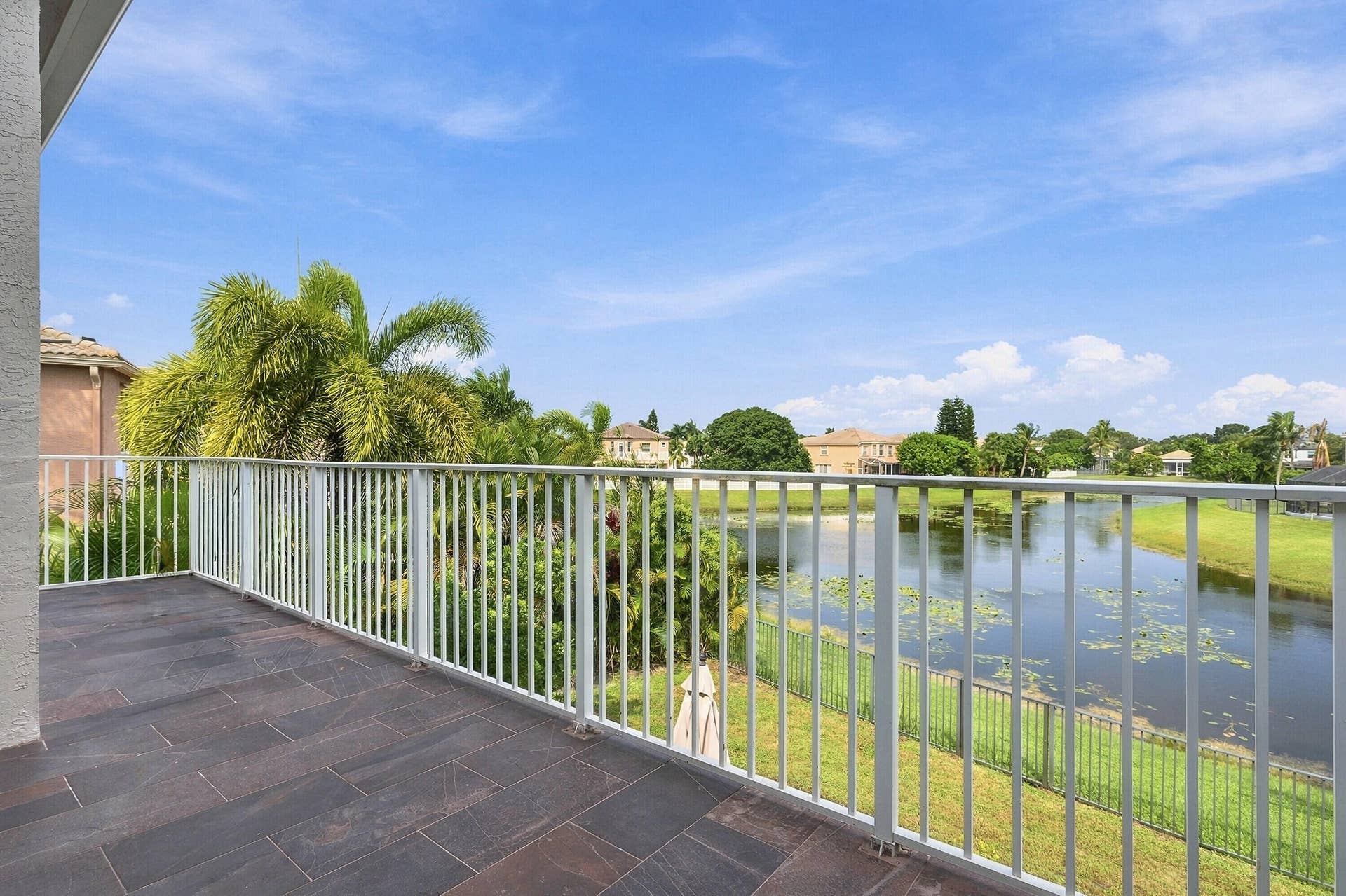 Large balcony off the Primary Bedroom on 2nd floor offers amazing views.