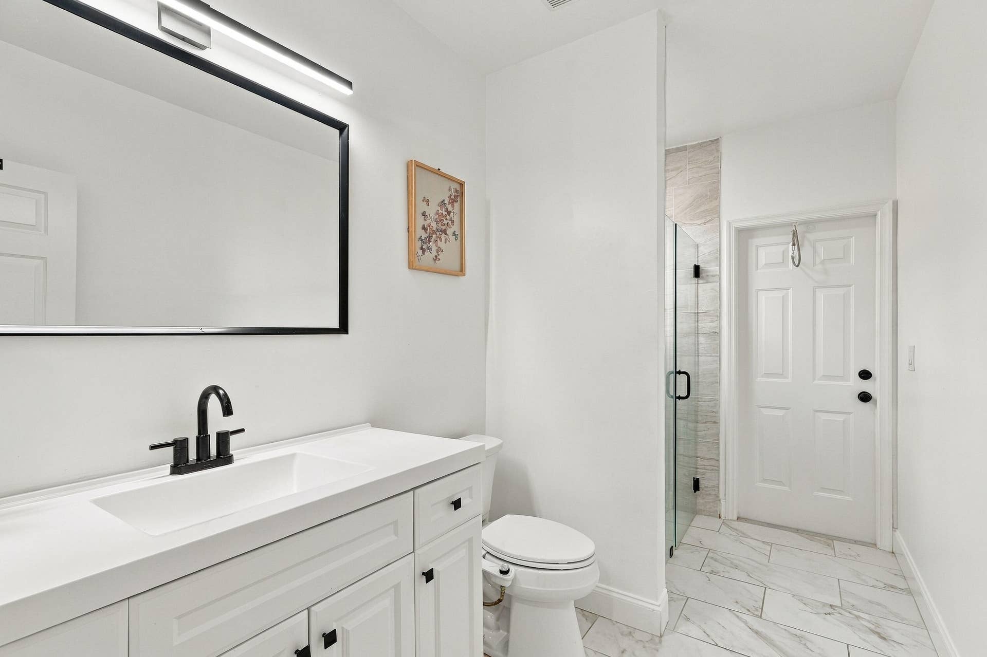 Downstairs full bath is an ensuite to ground floor bedroom.
