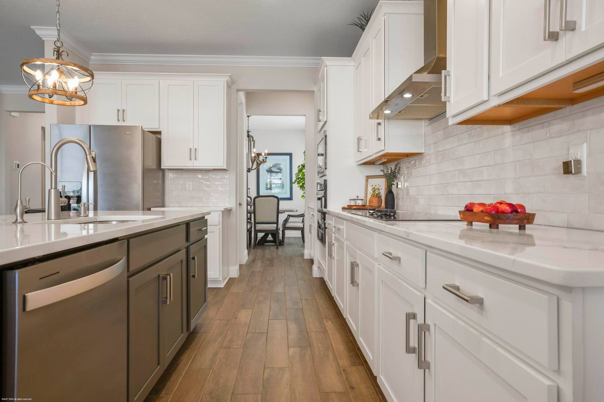 Kitchen cabinetry and tile backsplash