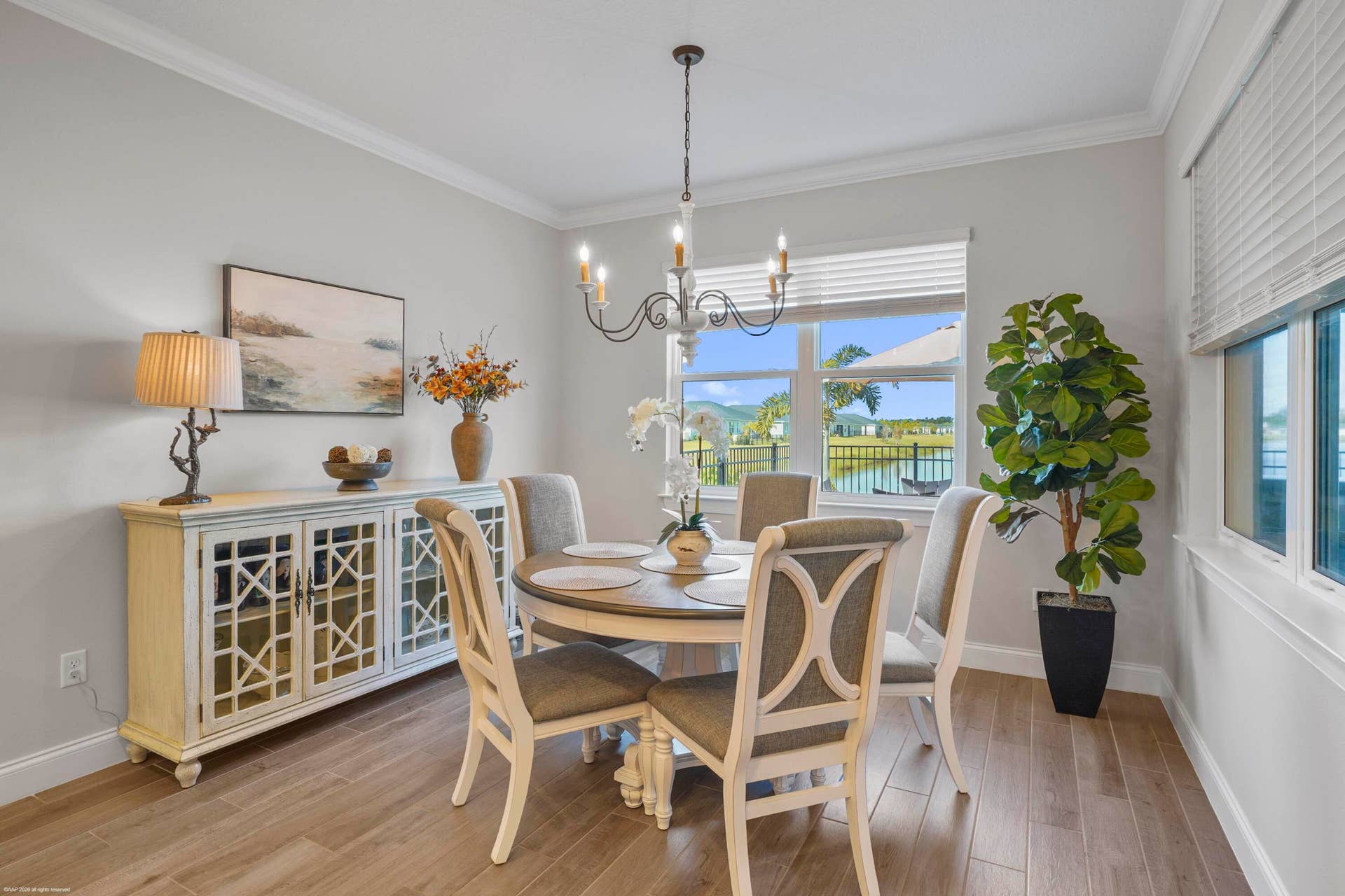 Breakfast nook with chandelier and built-in buffet