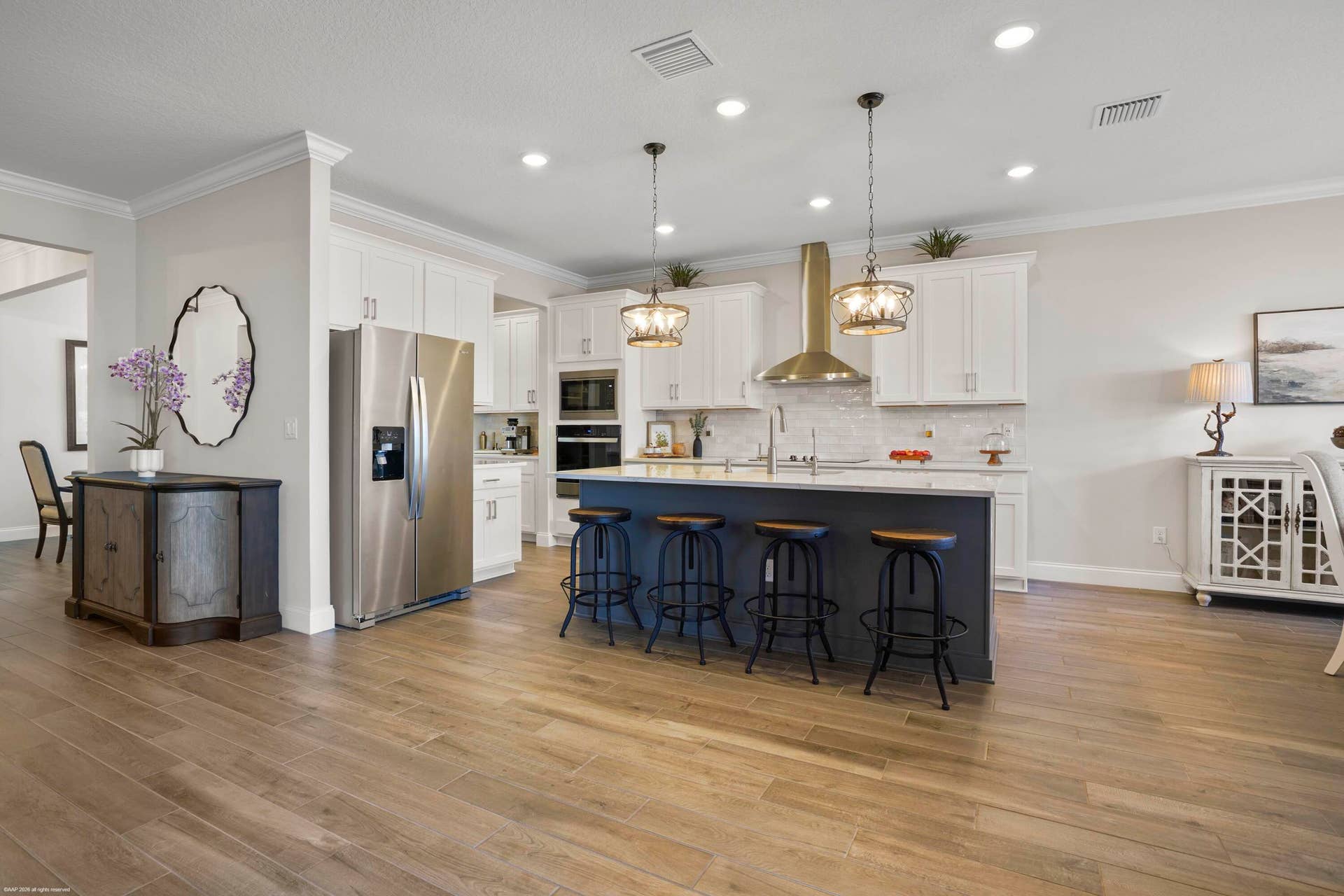 Gourmet kitchen opening to the great room