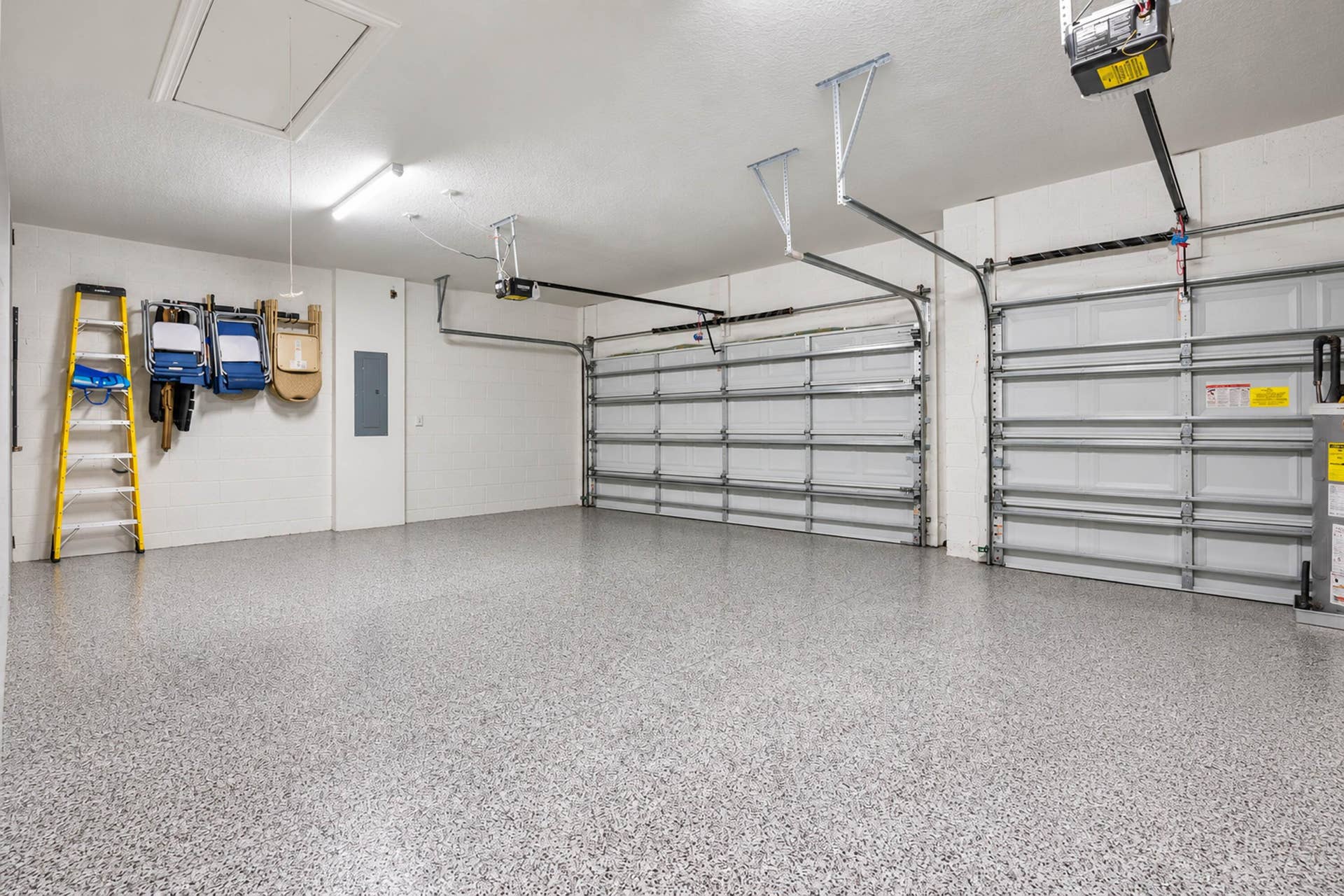 Three-car garage with epoxy-style floor