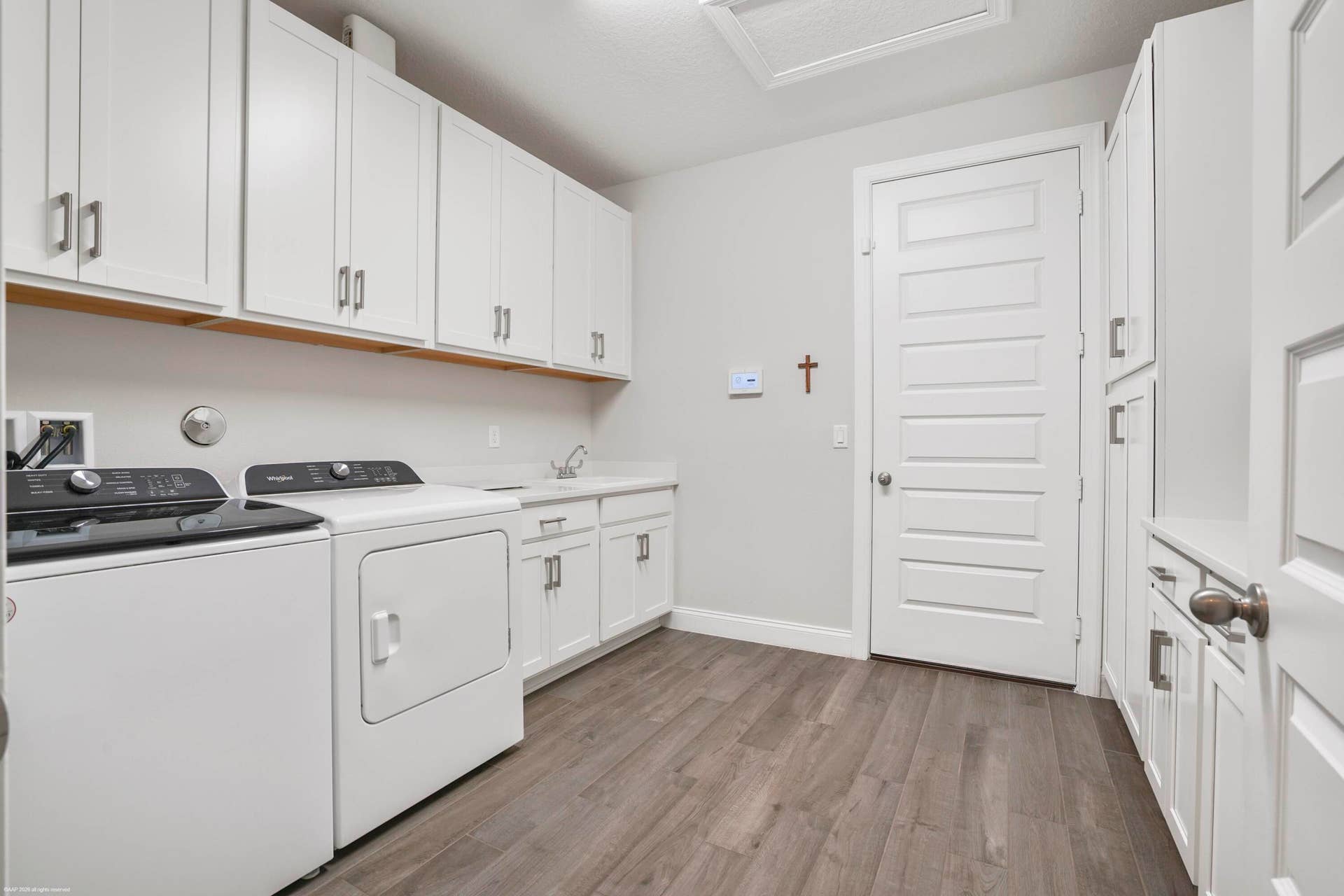Laundry room with cabinetry