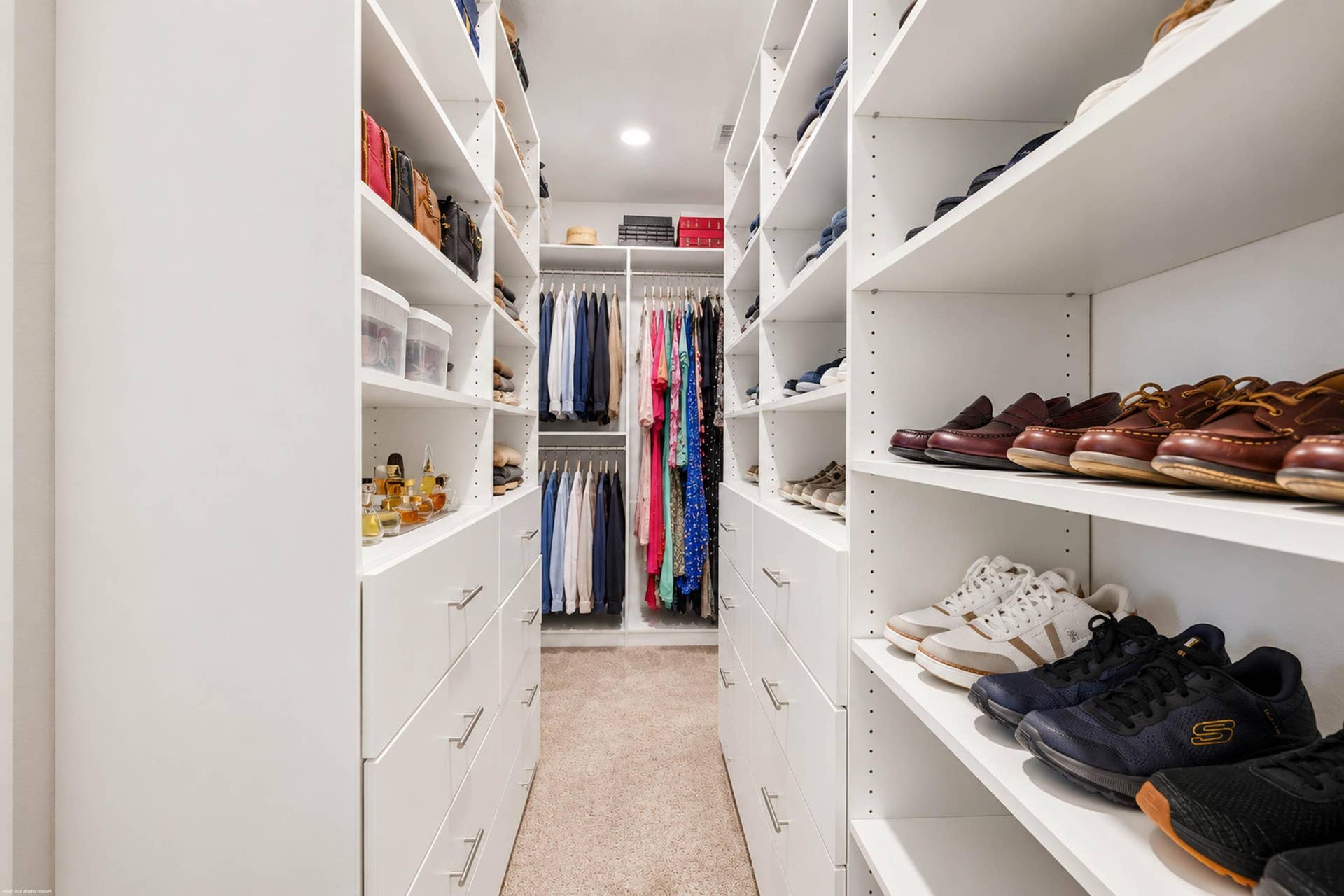 Walk-in closet with custom built-in shelving
