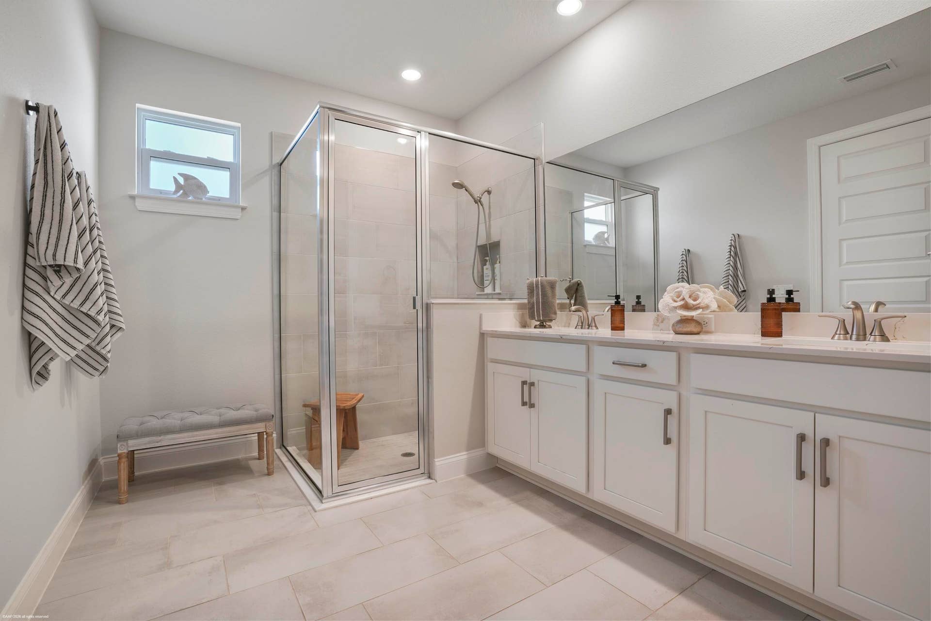 Primary bath with dual vanity and walk-in shower