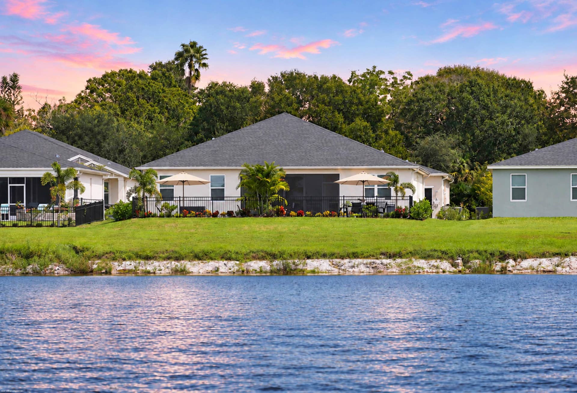 Lakefront rear elevations at dusk
