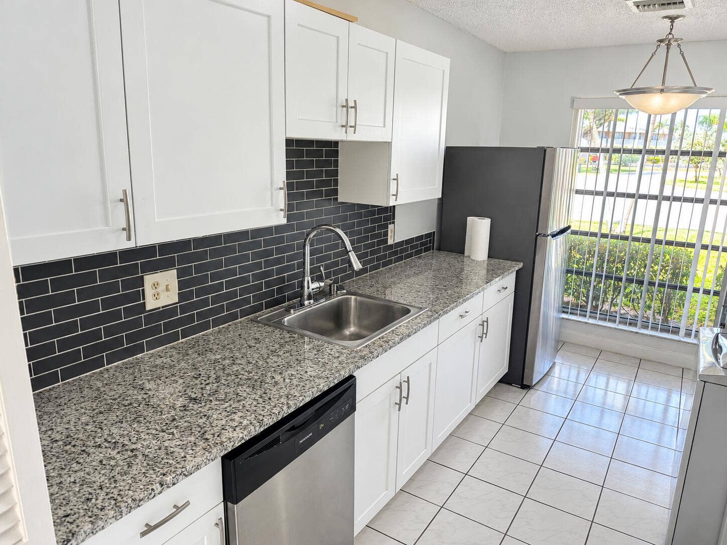 Bright Modern Galley Kitchen with Window