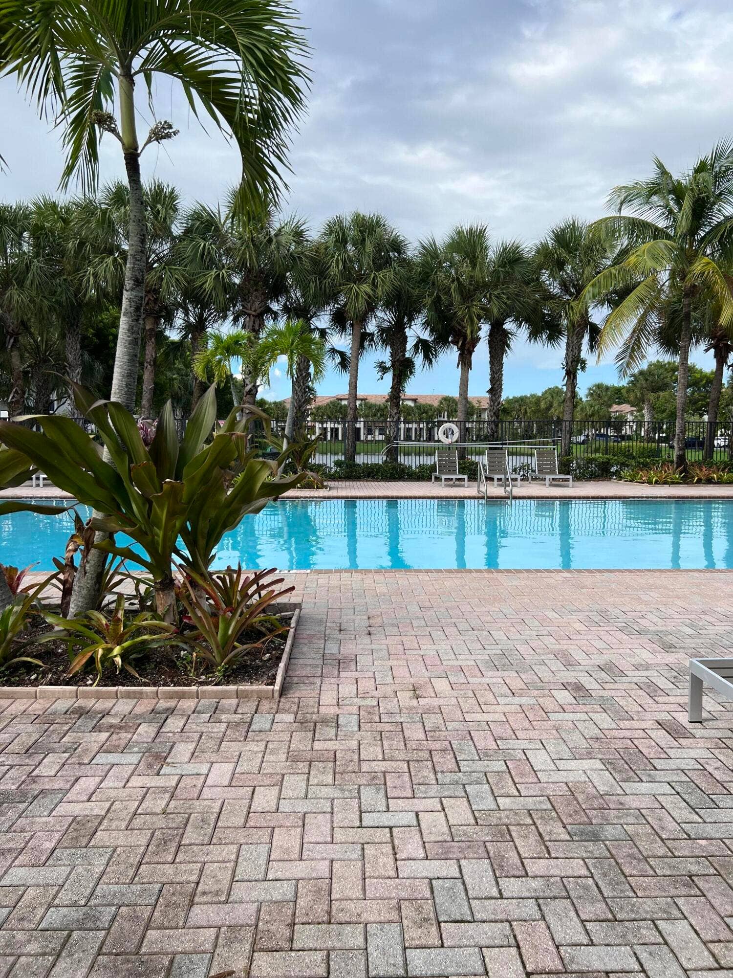 4784 Acadian Trail, Coconut Creek, FL 33073 Enjoy the community pool! Plenty of lounge chairs.