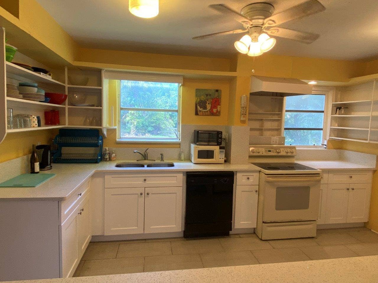 Kitchen with Dishwasher, Range/Oven and Ample Storage with View to Paddock