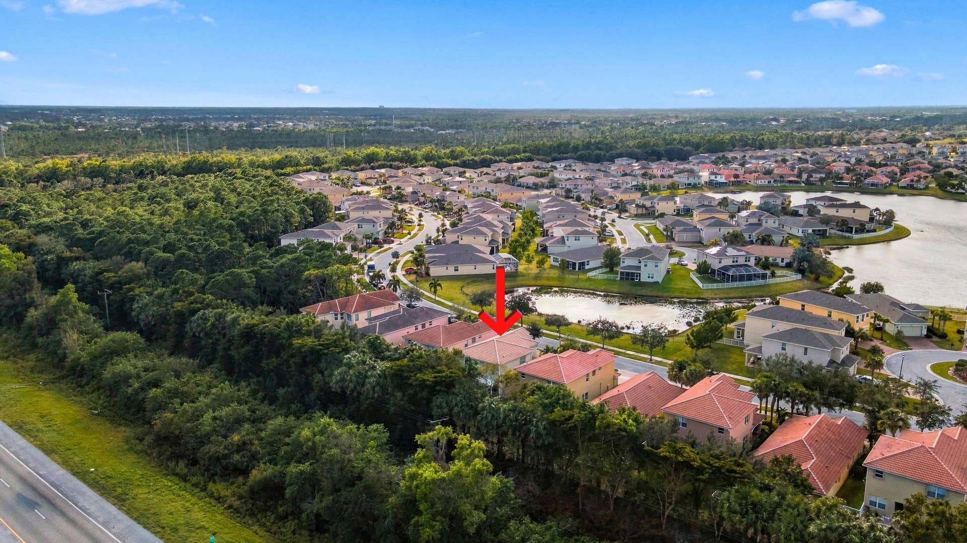 Aerial View of Neighborhood and Surrounding Landscape