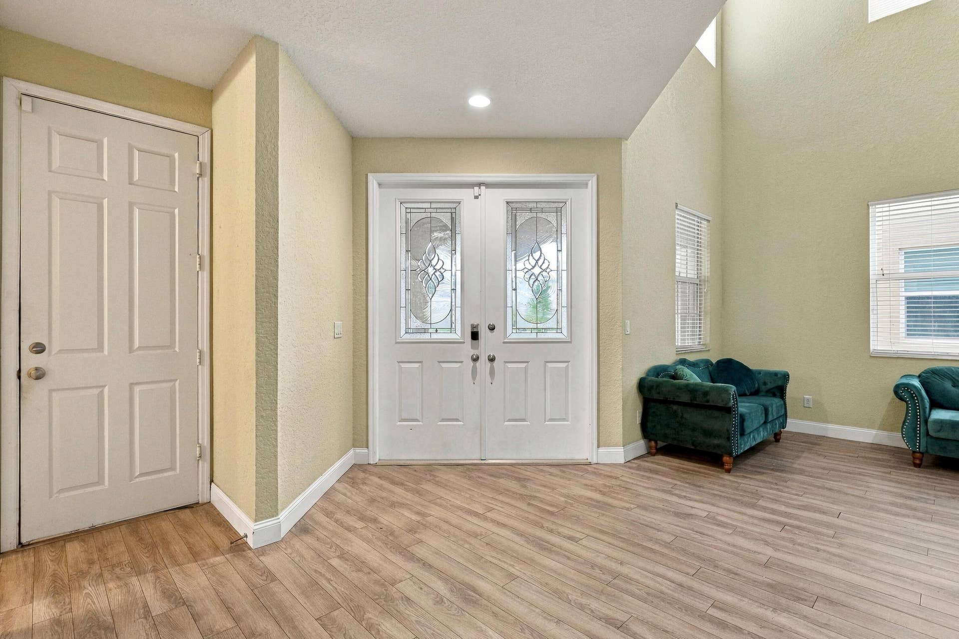 Welcoming Foyer and Double Door Entry