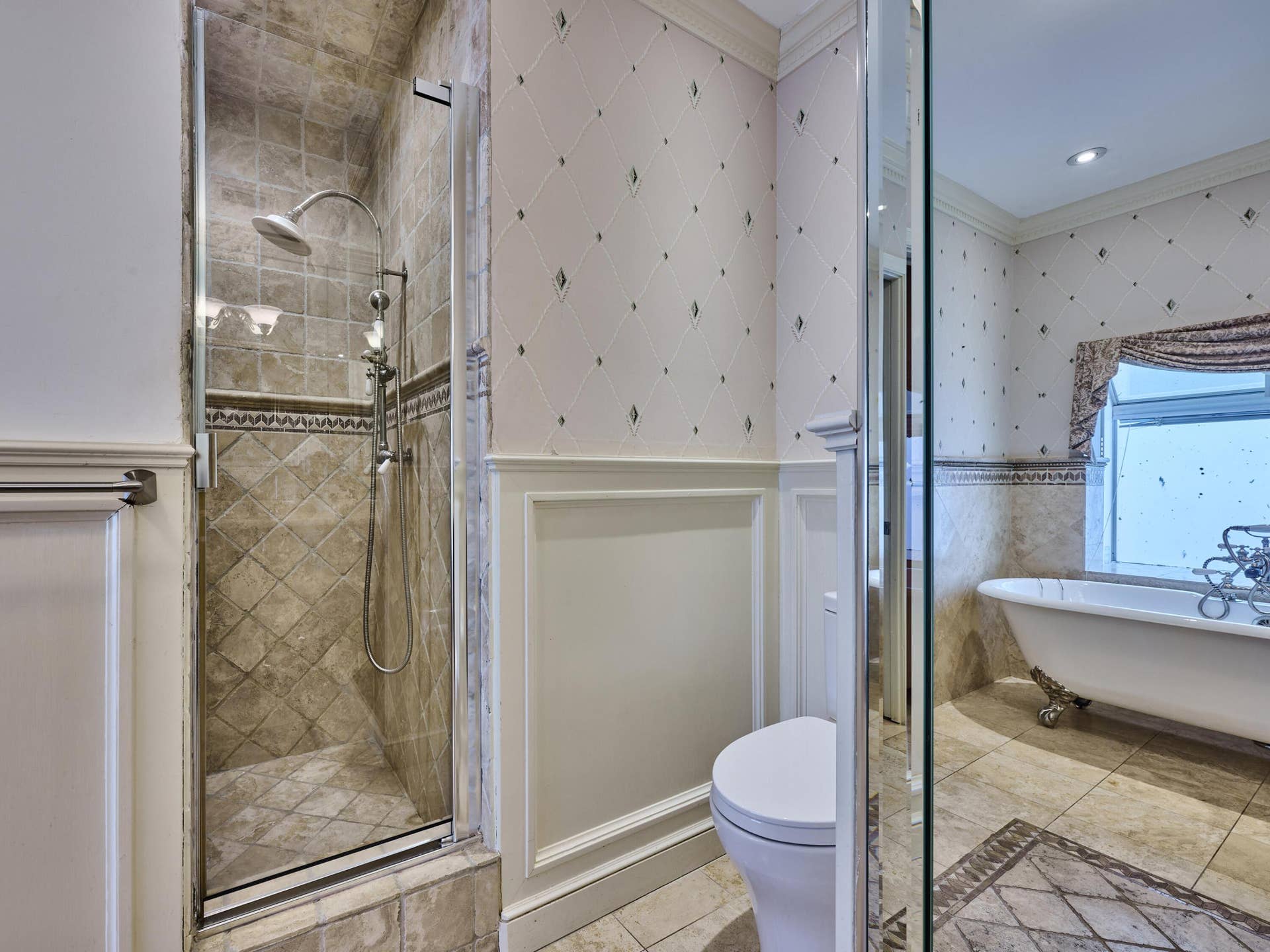 Primary bathroom; walk-in shower & tub.