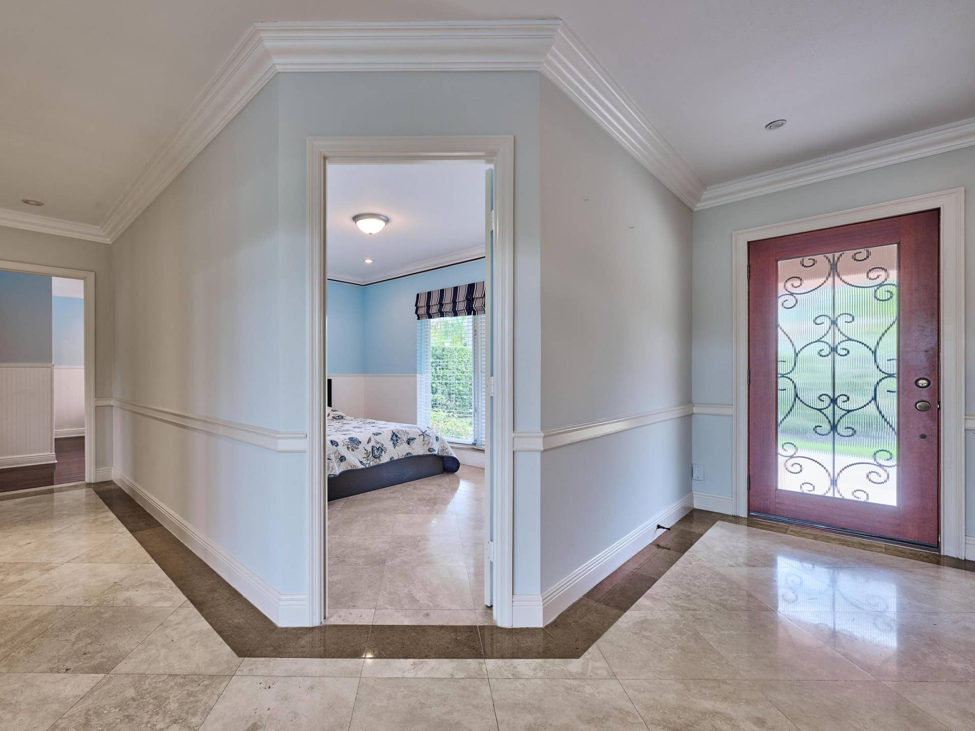 Hallway to two en-suite bedrooms to the left.