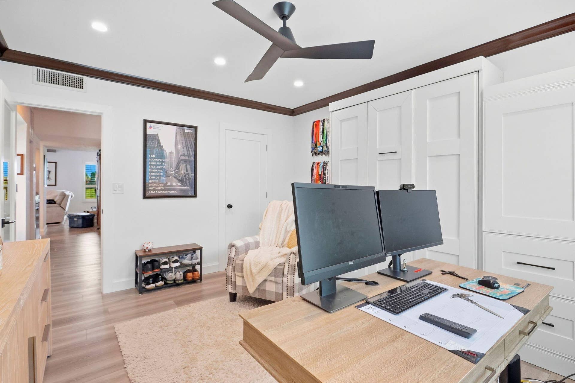 900 Greensward Lane, #209-G, Delray Beach, FL 33445 Recessed lighting, ceiling fan, crown molding, built-in cabinetry, and wood-finish flooring