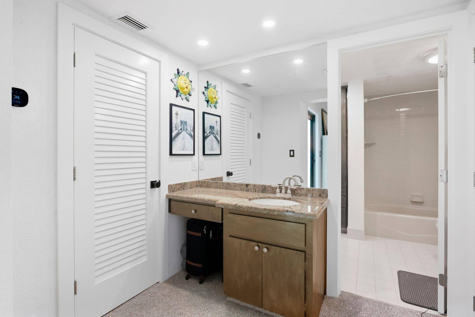 900 Greensward Lane, #209-G, Delray Beach, FL 33445 Vanity with a granite-style countertop and undermount sink
