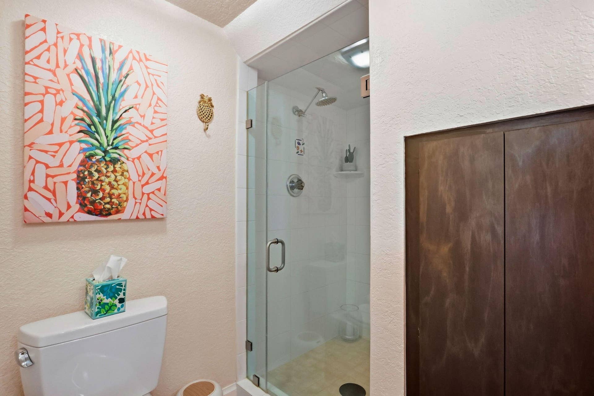 900 Greensward Lane, #209-G, Delray Beach, FL 33445 White toilet with a dual flush mechanism