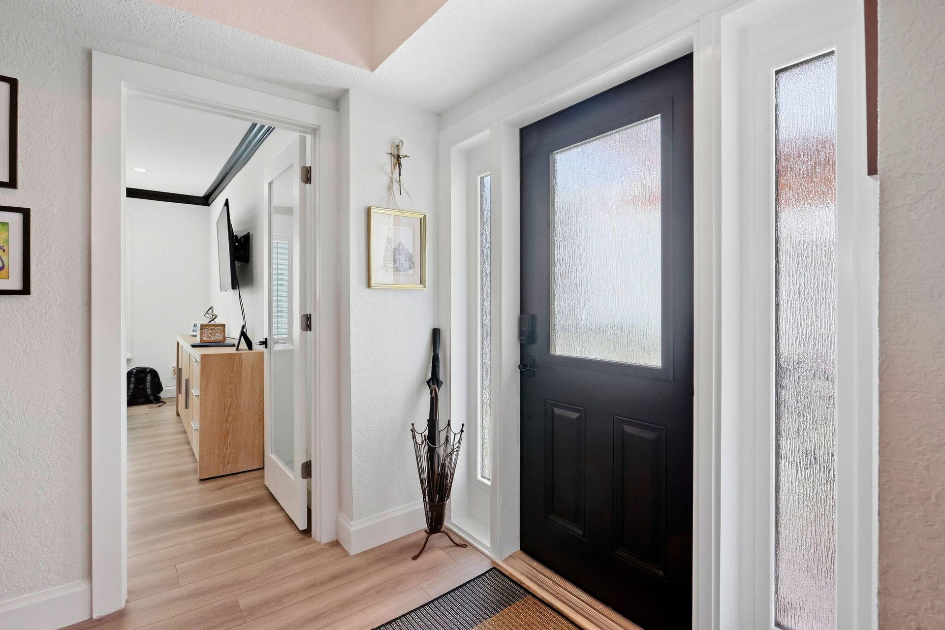 900 Greensward Lane, #209-G, Delray Beach, FL 33445 Black entry door with frosted glass panel and sidelights