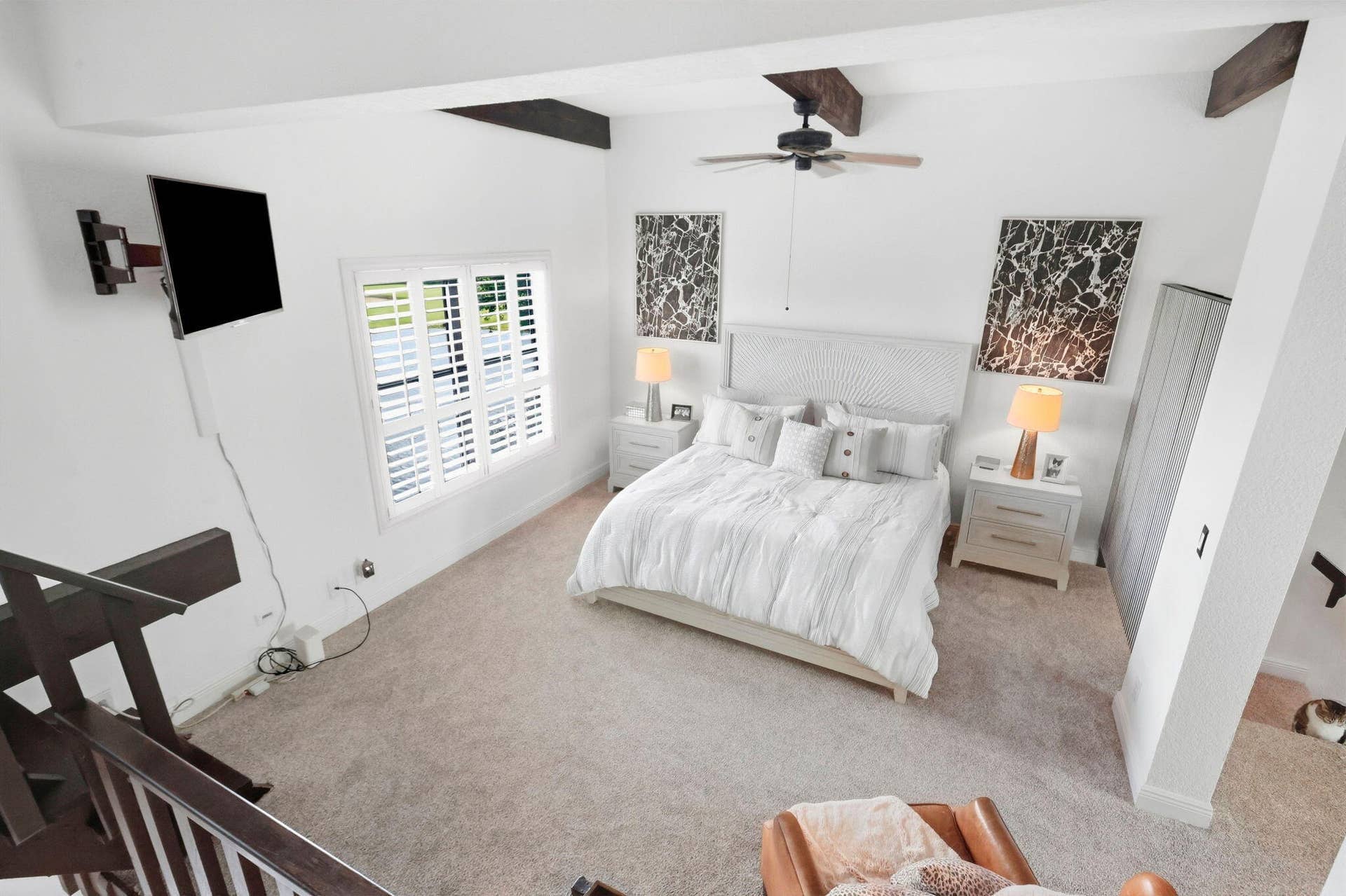 900 Greensward Lane, #209-G, Delray Beach, FL 33445 Vaulted ceilings with exposed wood beams, ceiling fan, carpeted flooring, and white plantation shutters