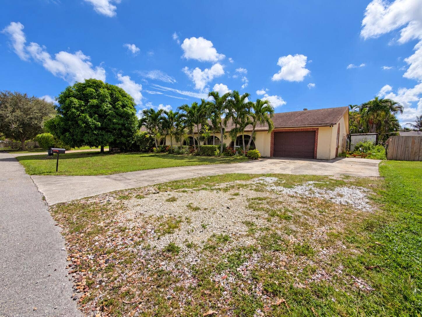3464 ARTESIAN Drive, Lake Worth, FL 33462 front side parking view