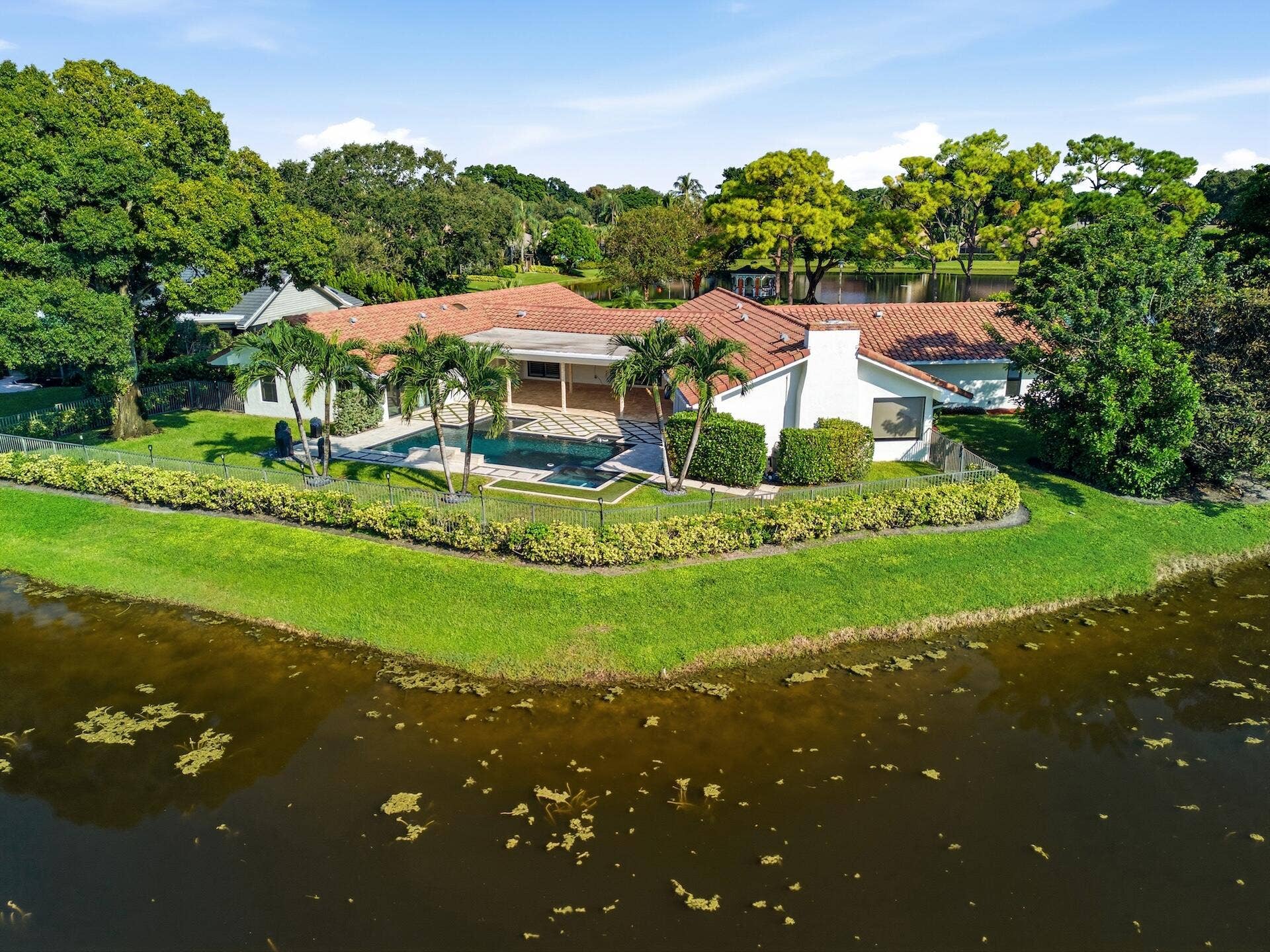 1013 SHADY LAKES Circle, Palm Beach Gardens, FL 33418 Aerial Rear Lake