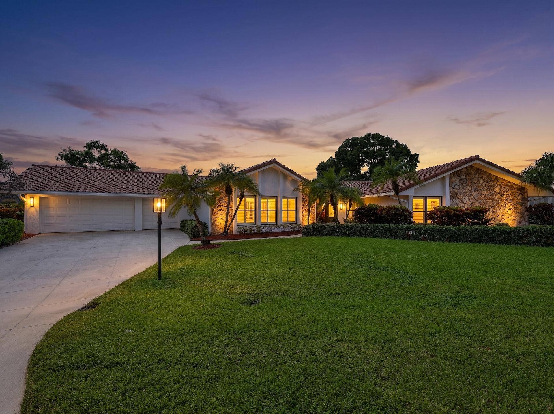 1013 SHADY LAKES Circle, Palm Beach Gardens, FL 33418 Front Exterior Sunset