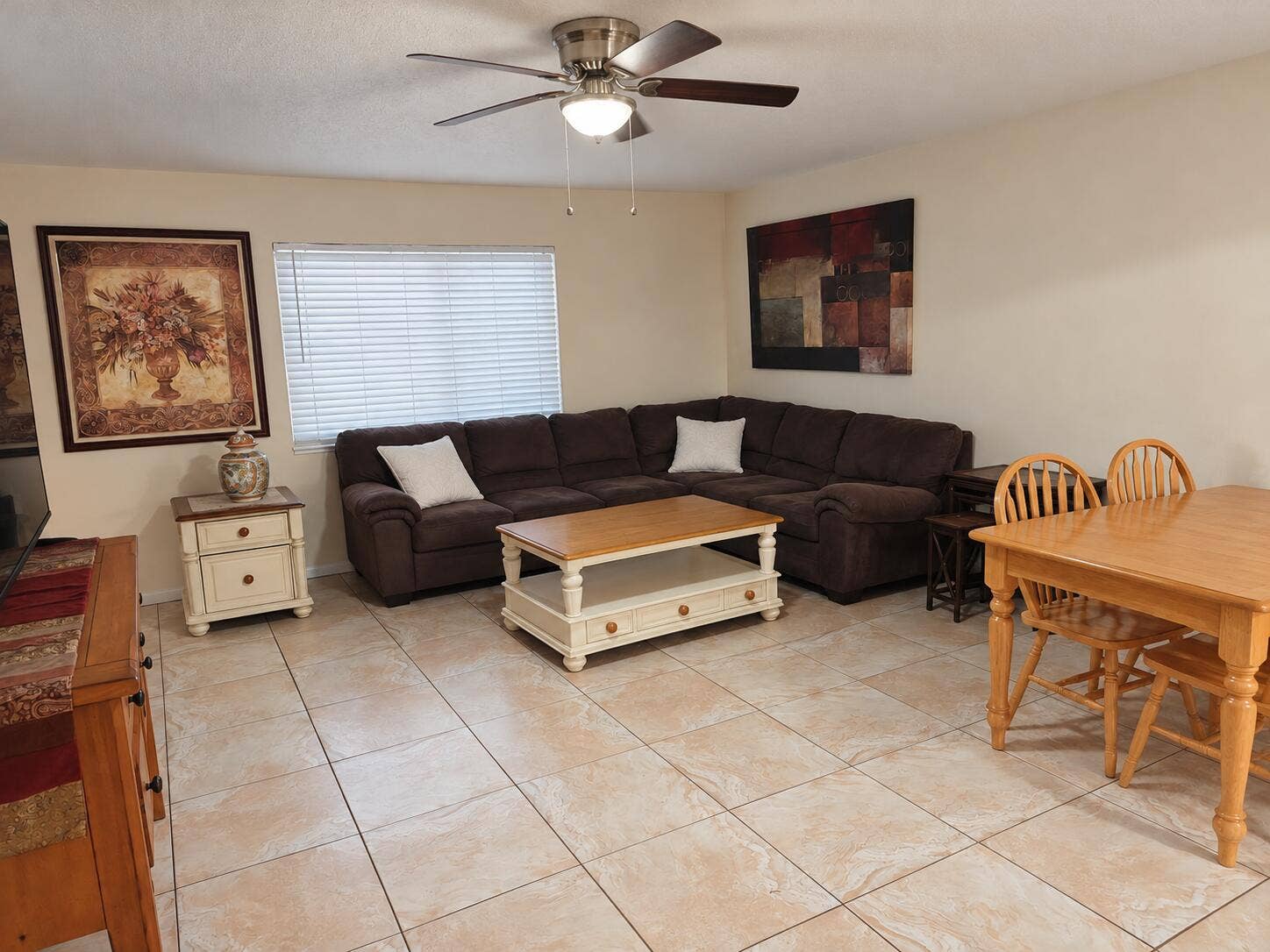 Recessed lighting, ceiling fan, window with blinds, and tile flooring