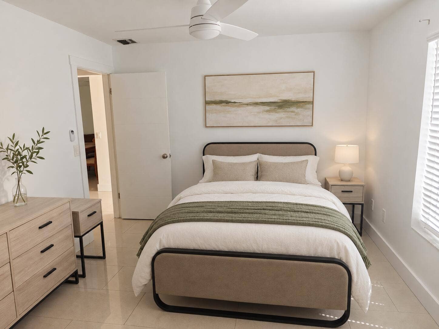 White walls with a ceiling fan