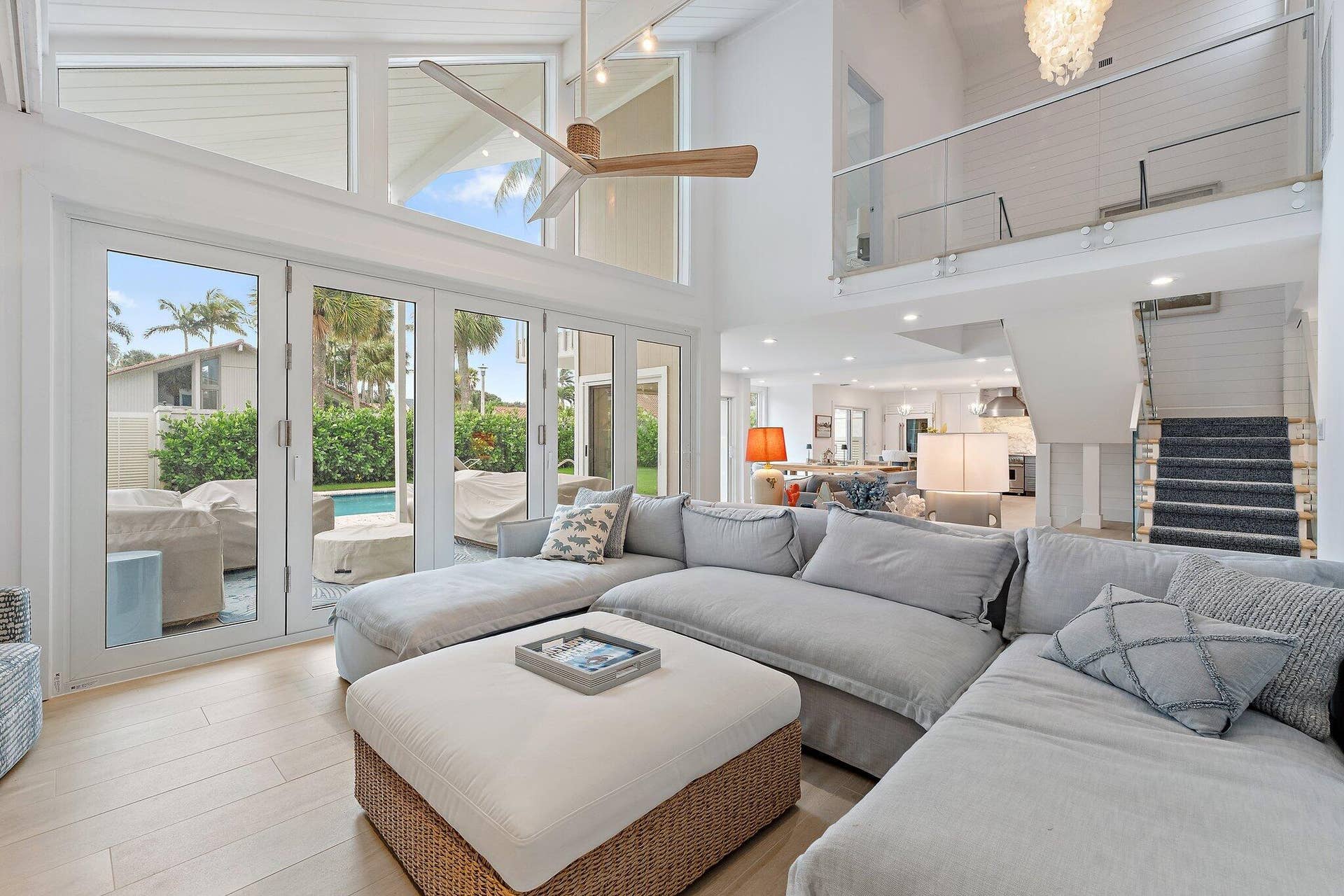 tons of natural light from double height windows + ceiling