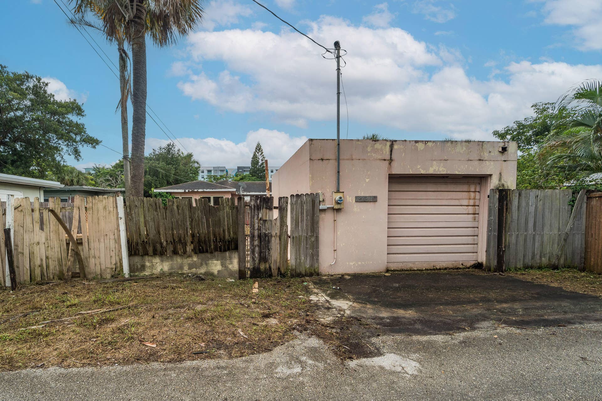 521 26TH Street, West Palm Beach, FL 33407 View of detached, 1-car garage. Access from both the backyard and the alley.
