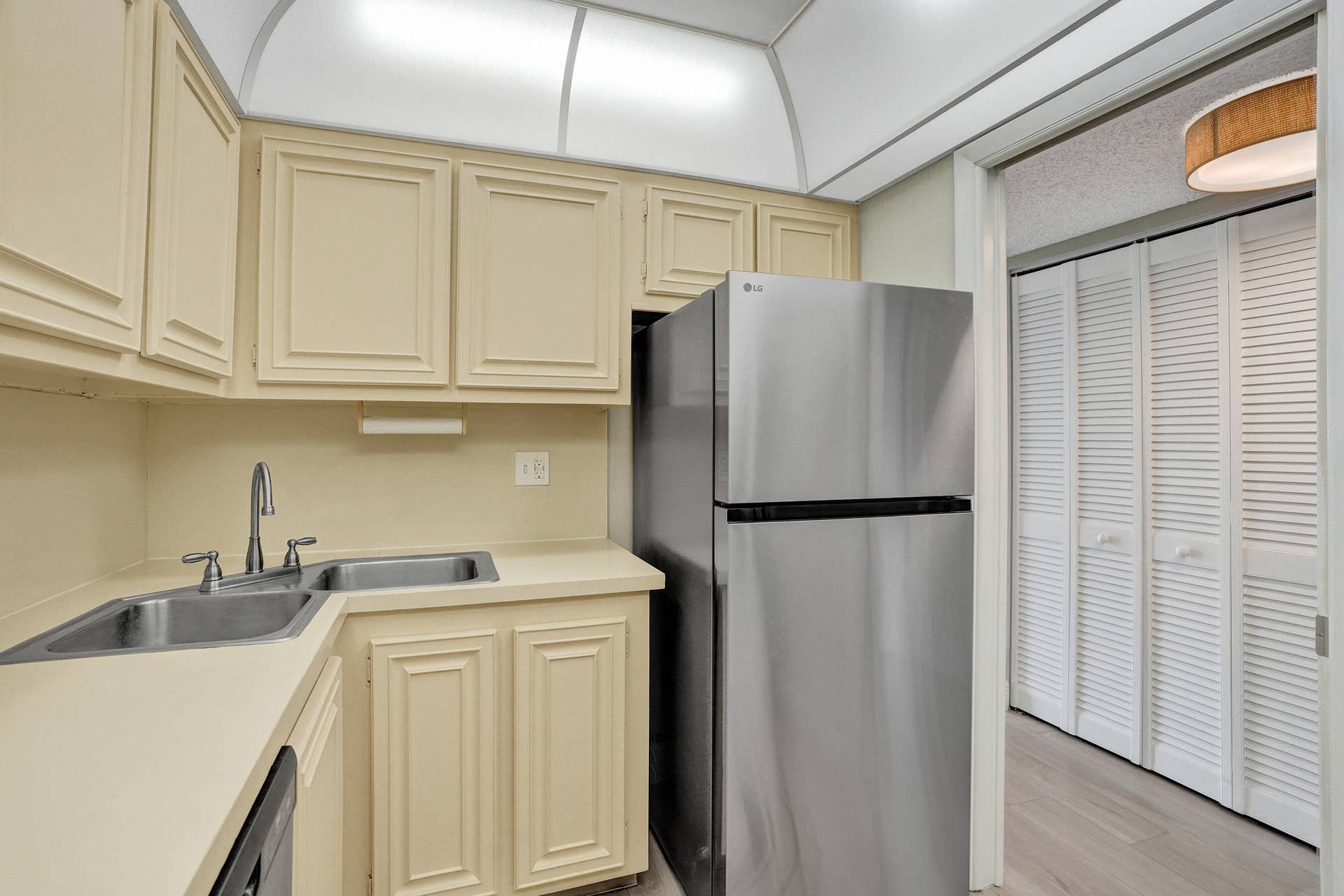 Charming vintage kitchen cabinetry with Stainless Steel Appliances
