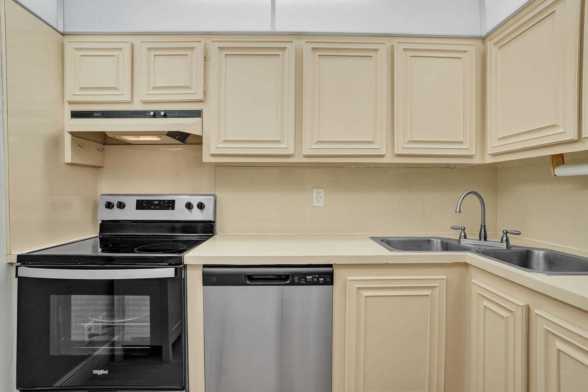 Charming vintage kitchen cabinetry with Stainless Steel Appliances