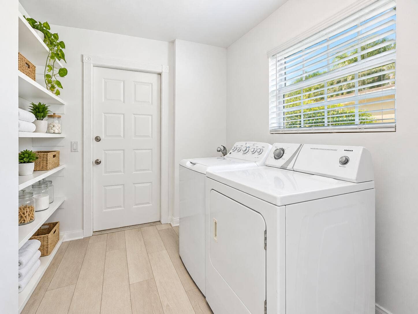 8282 Old Forest Road, Palm Beach Gardens, FL 33410 Laundry Room With Storage Shelves