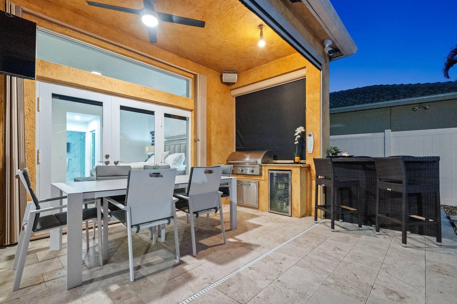 Summer BBQ kitchen with 36" built-in grill and wine/beverage refrig.
