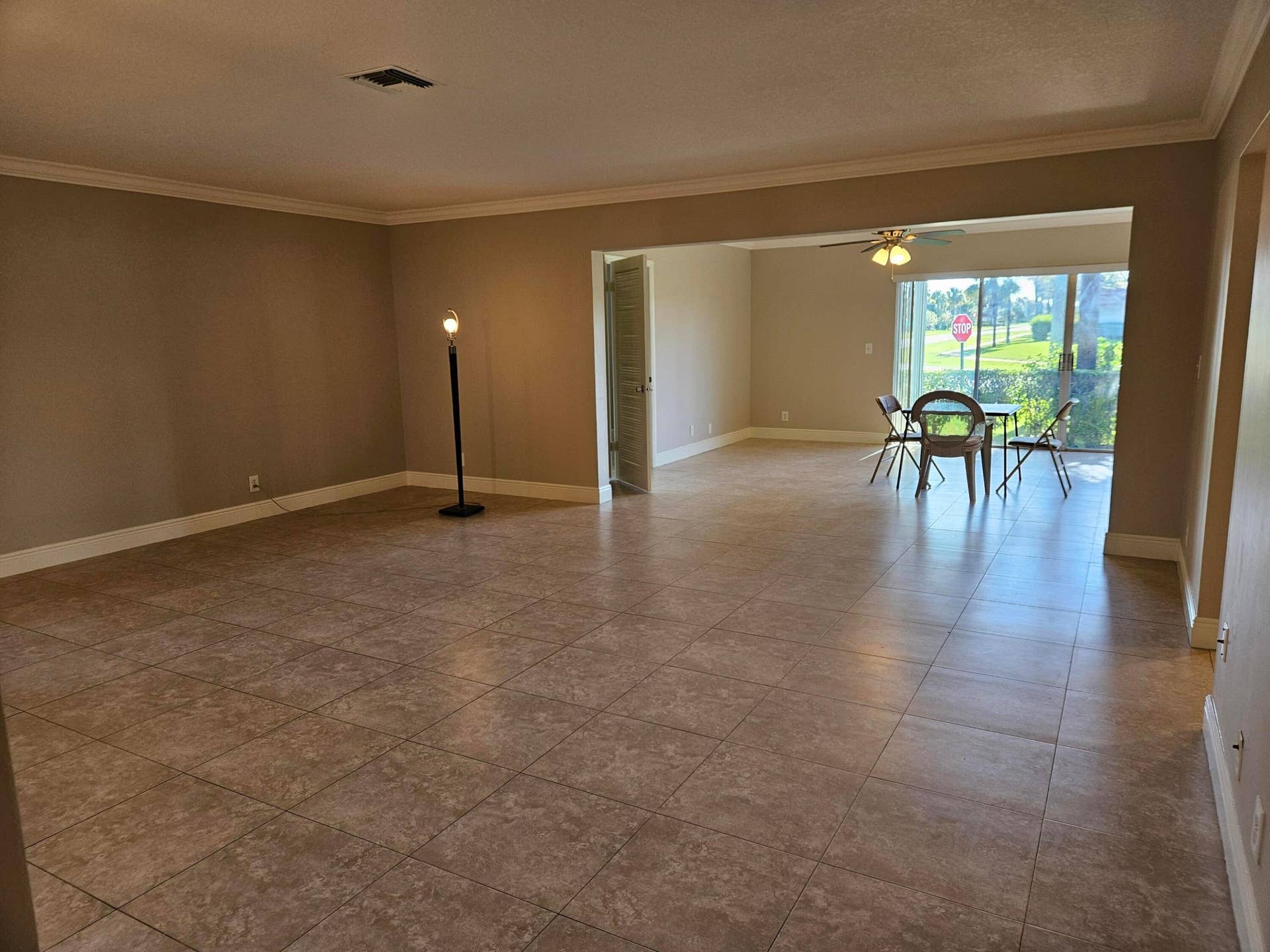 2886 Fernley Drive E, #1, West Palm Beach, FL 33415 Living room facing family room