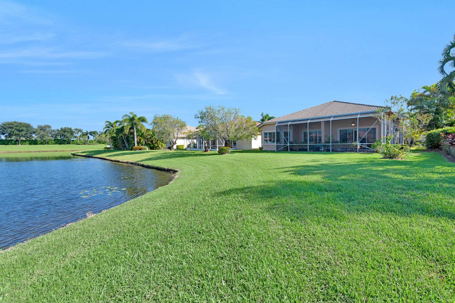 9542 Lantern Bay Circle, West Palm Beach, FL 33411 Rear to Patio & Lake