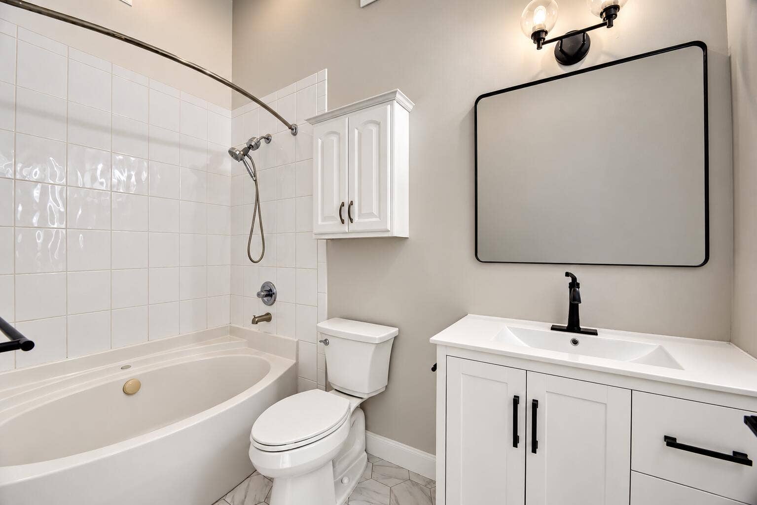 271 SE 22nd Street, Fort Lauderdale, FL 33316 Modern Greige Bathroom with Black Accent