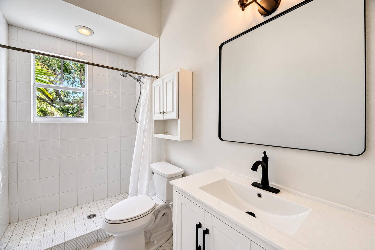 271 SE 22nd Street, Fort Lauderdale, FL 33316 Bright Minimalist Bathroom with Leafy Sh