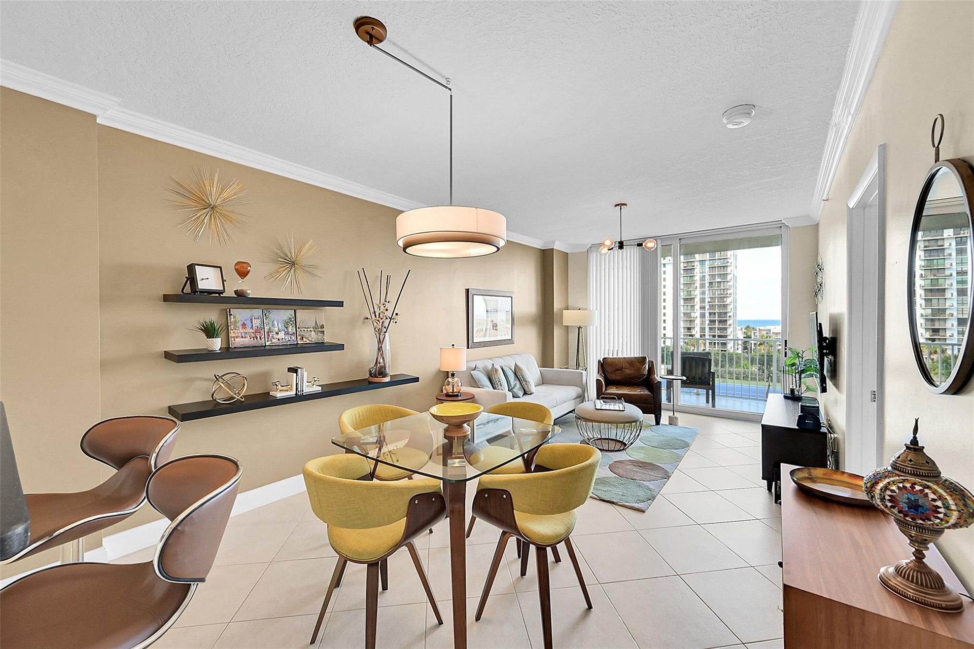 3020 NE 32ND Avenue, #805, Fort Lauderdale, FL 33308 The spacious living area is designed to maximize comfort while showcasing spectacular ocean views.