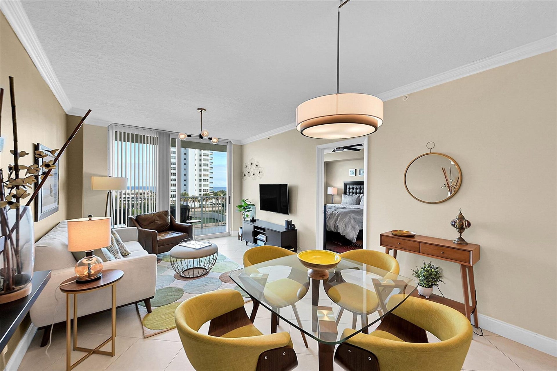 3020 NE 32ND Avenue, #805, Fort Lauderdale, FL 33308 Open dining and living areas create an inviting space for relaxing, entertaining, and enjoying the oceanfront lifestyle.