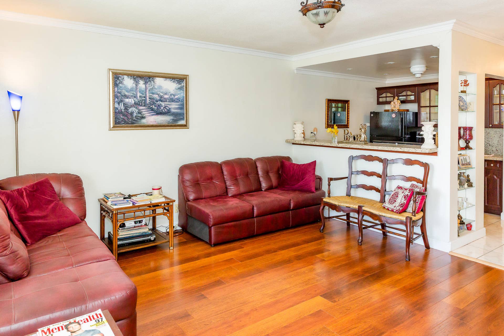 630 Layne Boulevard, #208, Hallandale Beach, Hallandale Beach, FL 33009 Hardwood flooring throughout, crown molding, cased opening with a built-in shelf, and recessed lighting
