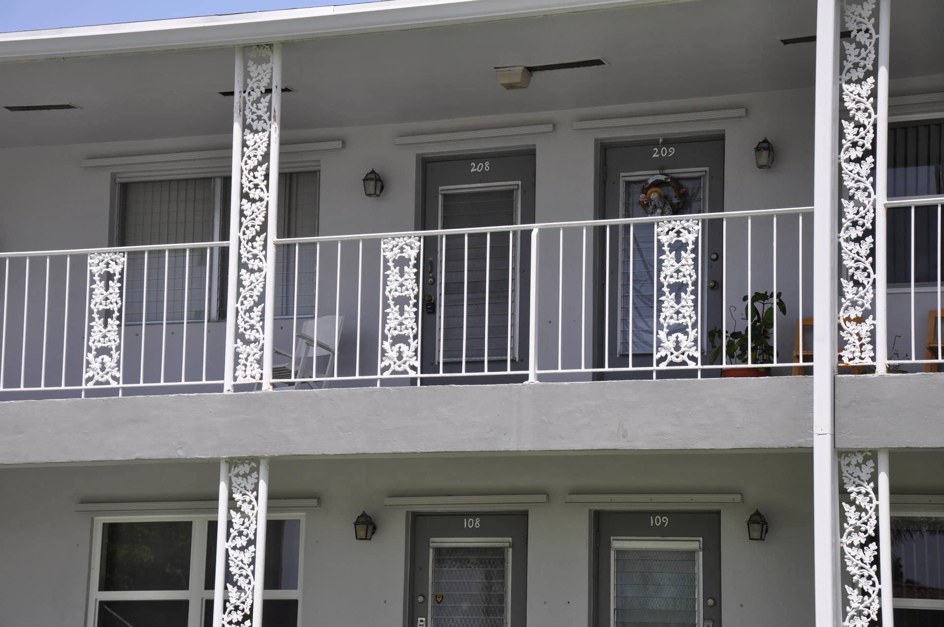 630 Layne Boulevard, #208, Hallandale Beach, Hallandale Beach, FL 33009 Exterior featuring multiple private balconies with decorative white railings and supporting columns