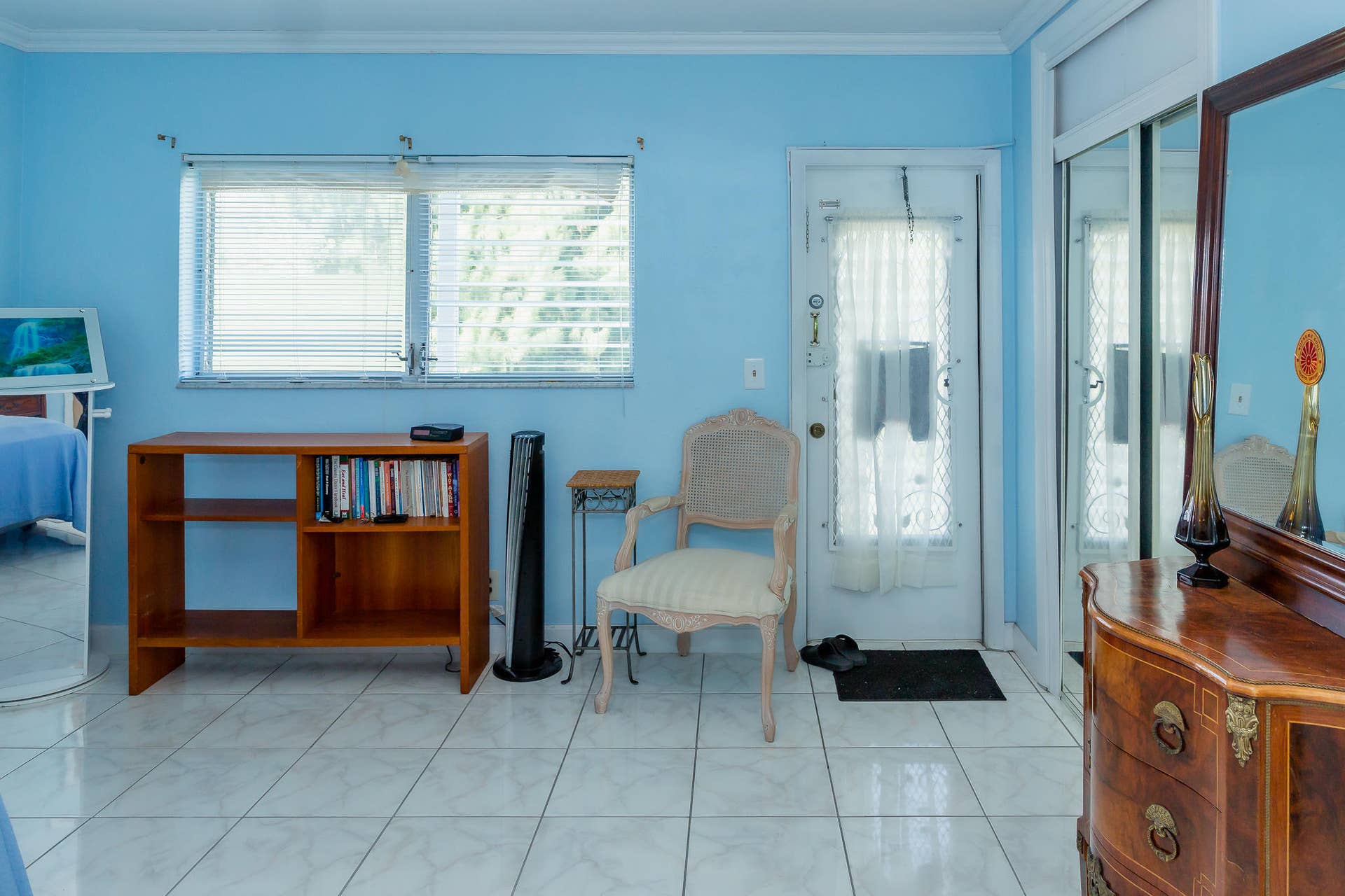 630 Layne Boulevard, #208, Hallandale Beach, Hallandale Beach, FL 33009 White tile flooring, sliding glass mirror closet doors, windows with horizontal blinds, and an exterior door