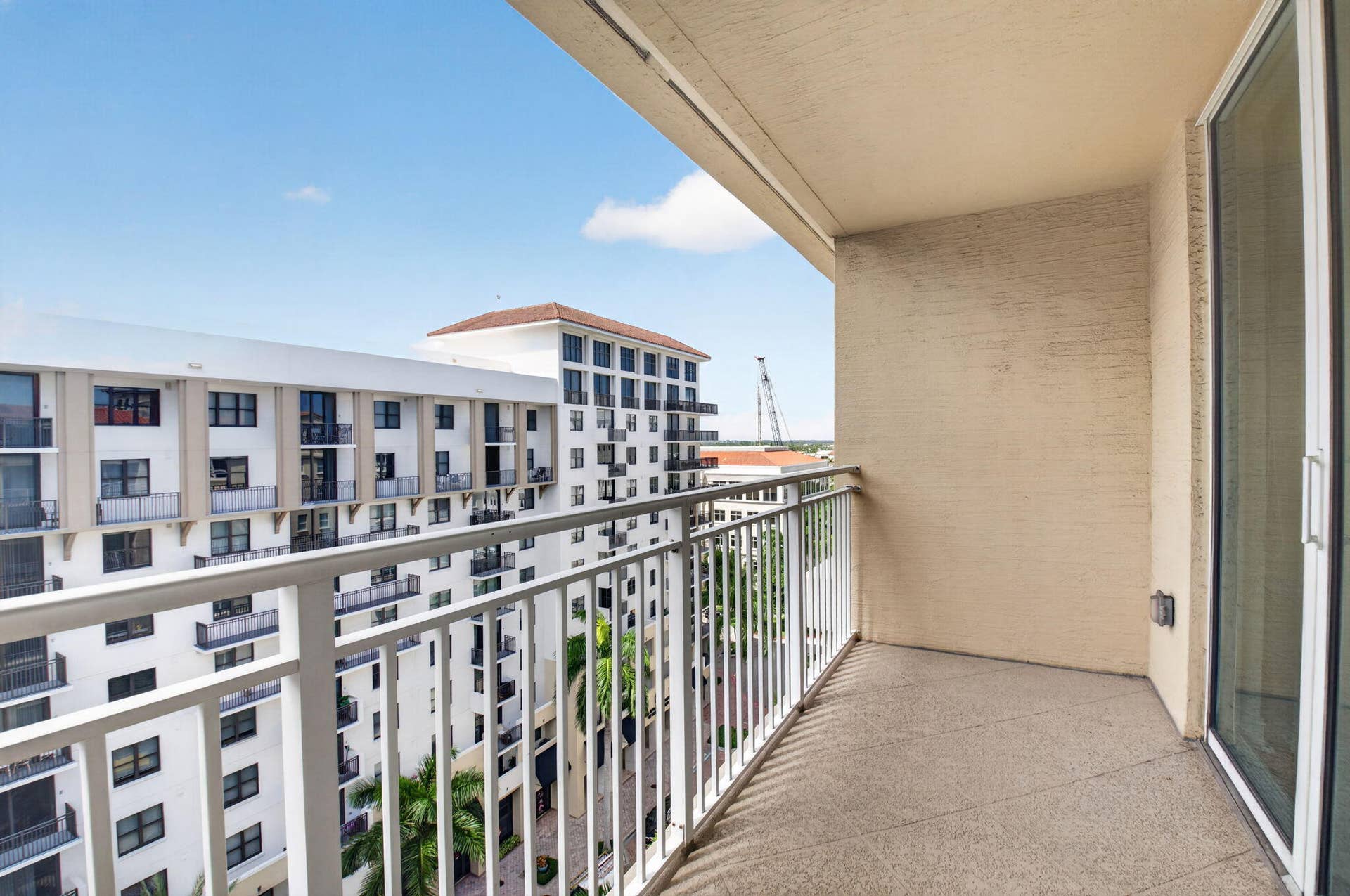 99 SE Mizner Boulevard, #Ph37, Boca Raton, FL 33432 Private balcony with sliding glass doors.