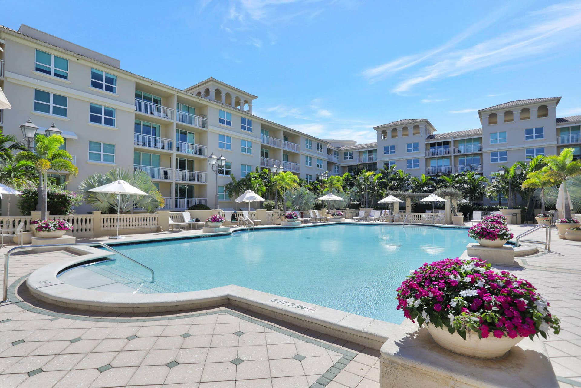 99 SE Mizner Boulevard, #Ph37, Boca Raton, FL 33432 Expansive resort-style pool with dedicated lounge areas.
