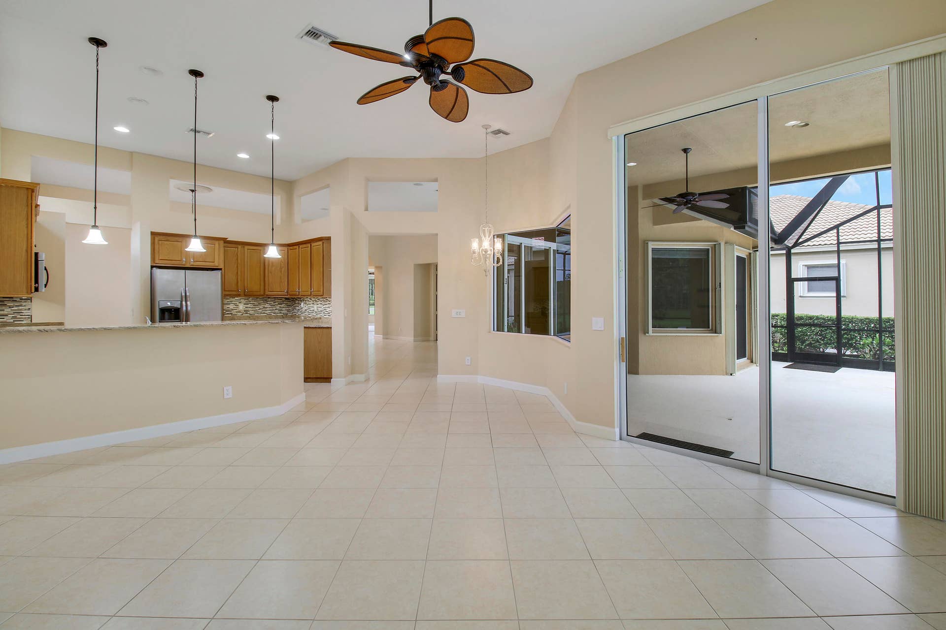 7603 Greenbrier Circle, Port St Lucie, FL 34986 Family Room to Kitchen