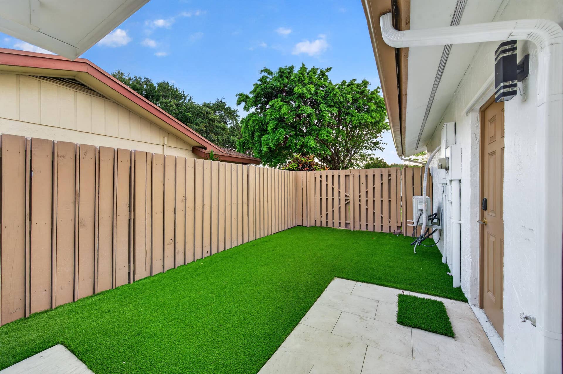 3088 NW 26TH Avenue, Boca Raton, FL 33434 Garage entrance through backyard