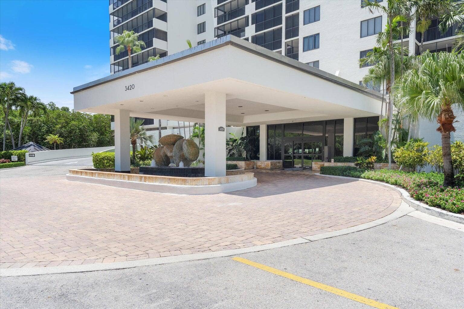 COVERED ENTRANCE AND GARAGE PARKING