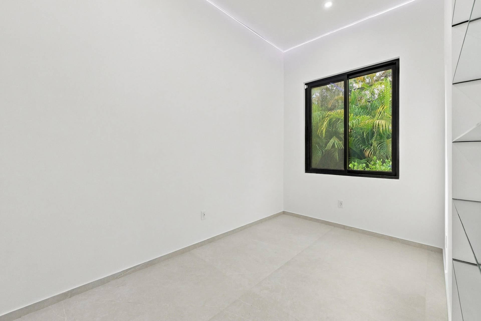 Office with glass wall looking at your beautiful living room .