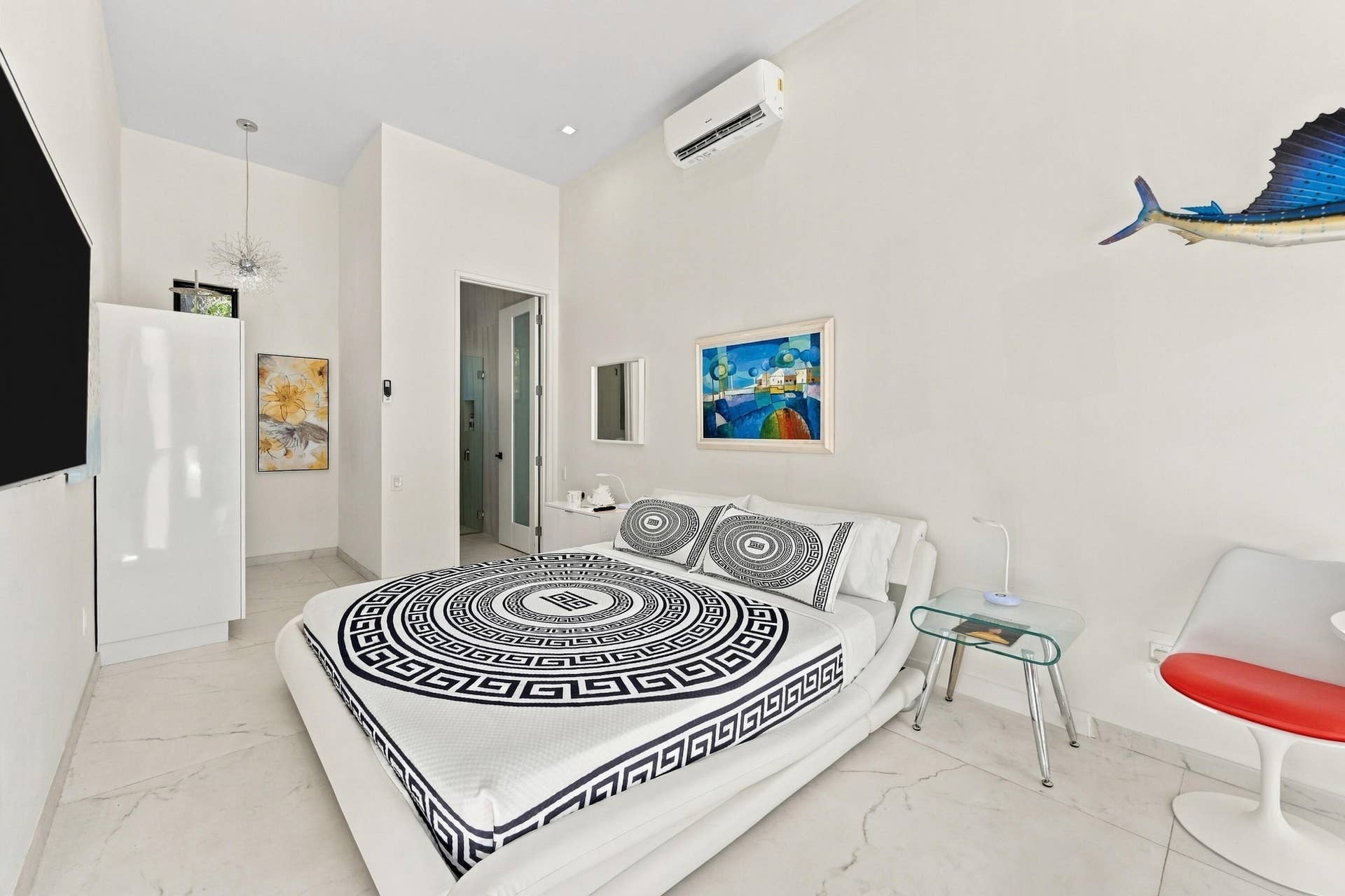 110 NE 16TH Place, Fort Lauderdale, FL 33305 Recessed lighting, light-toned tile flooring, built-in air conditioning unit, and a built-in wardrobe